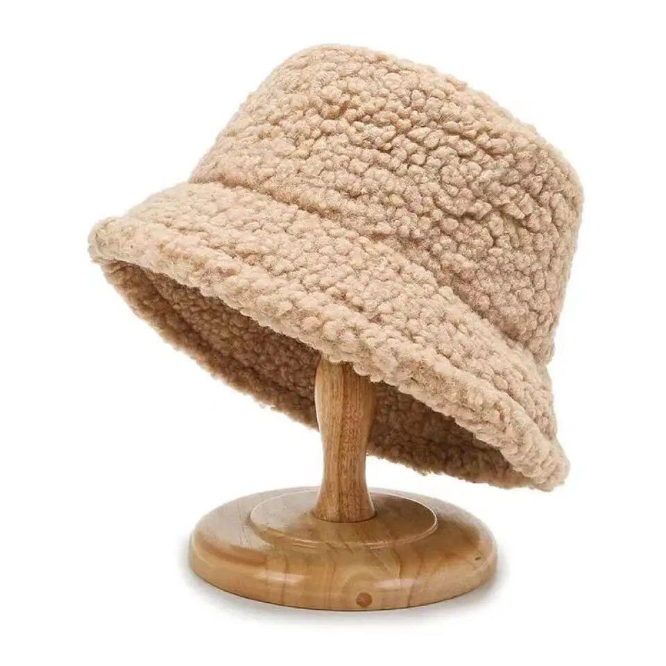 Lambswool unisex bucket hat for men and women, perfect for winter, outdoor activities, and sun protection. Panama fisherman's cap with embroidered lettering. Wholesale chapeau. Sizes: 56-58cm; Parallel import.