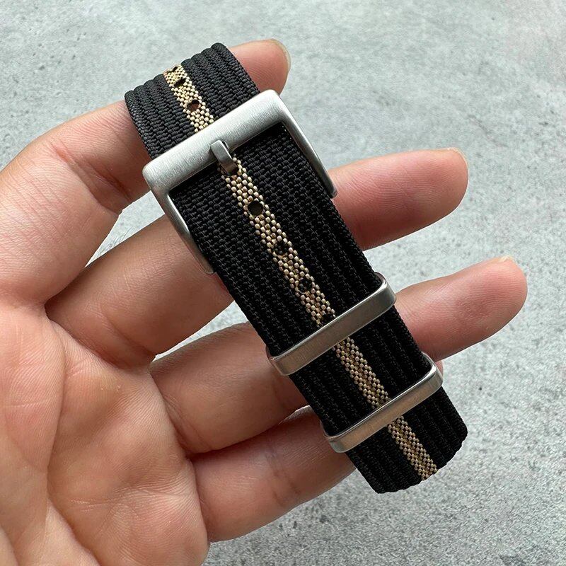 Fashion sports watch band in black, yellow, and gray. Ribbed nylon strap compatible with Blancpain, Omega, and Swatch models. Band color: mm. Ships from: Parallel import.