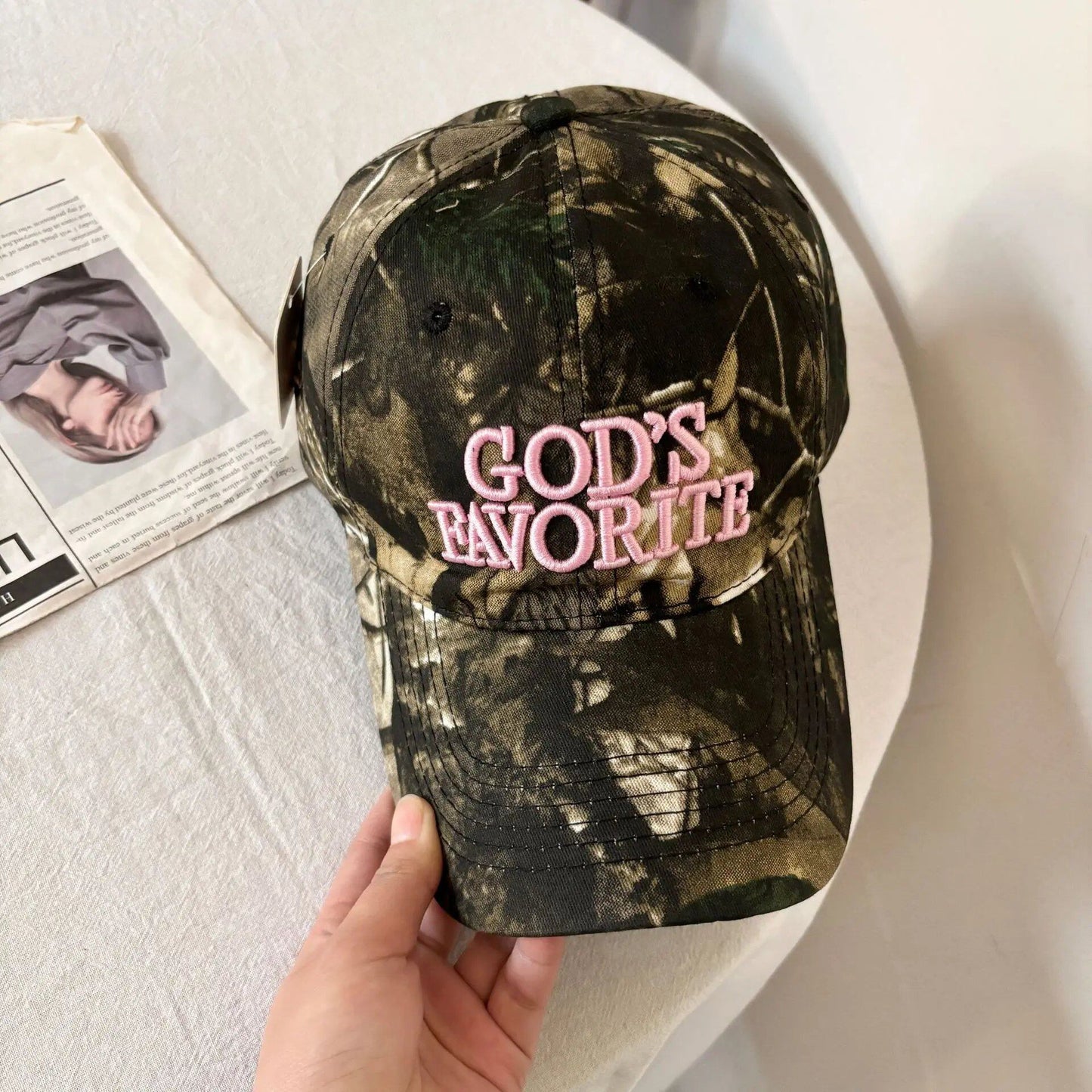 Versatile, trendy, and stylish embroidered camo cap with a spiritual message. Adjustable spring baseball cap. Sizes: 54-60cm; Ages: Teens to Adults; Ships from: Parallel Import