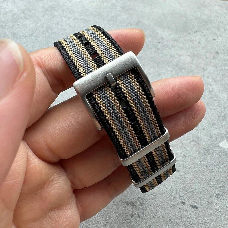 Fashion sports watch band in black, yellow, and gray. Ribbed nylon strap compatible with Blancpain, Omega, and Swatch models. Band color: mm. Ships from: Parallel import.