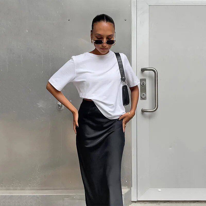 Elegant black satin trumpet skirt for women. Slim, high-waisted, long skirt for spring and summer. Solid color. Size: Parallel import.