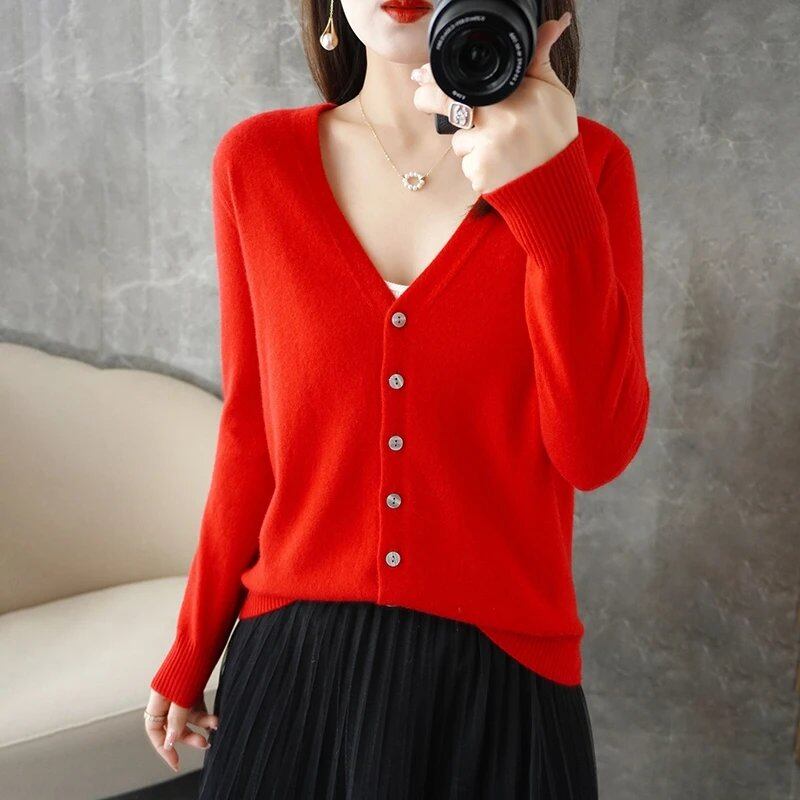New Arrival: Stylish V-neck sweater/cardigan in a subtle Xiao Xiang style. Special Price Coat. ZHI D035. Size: Parallel Import.