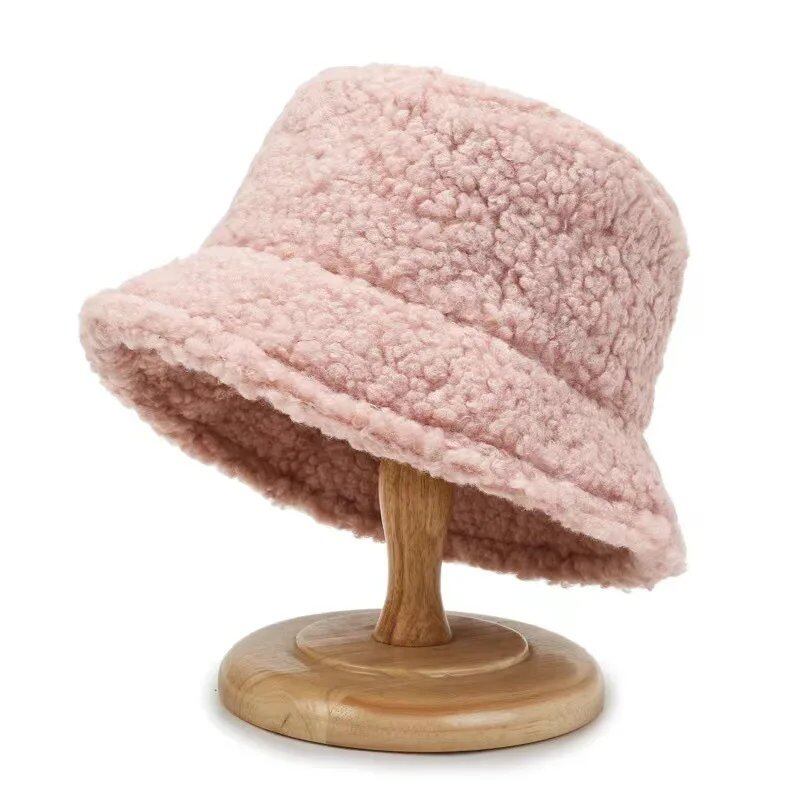 Lambswool unisex bucket hat for men and women, perfect for winter, outdoor activities, and sun protection. Panama fisherman's cap with embroidered lettering. Wholesale chapeau. Sizes: 56-58cm; Parallel import.