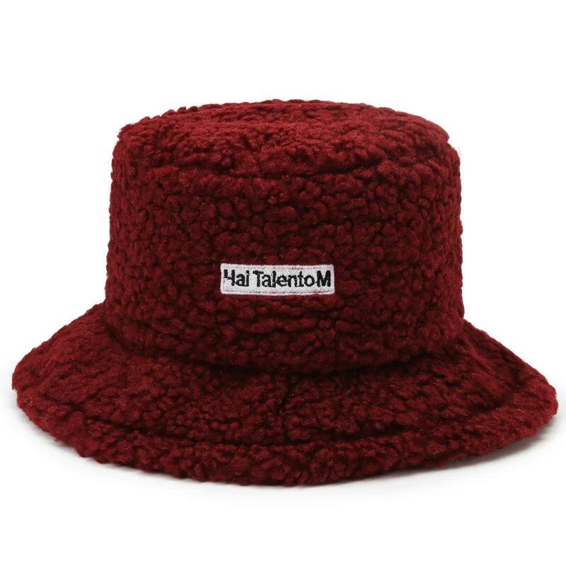 Lambswool unisex bucket hat for men and women, perfect for winter, outdoor activities, and sun protection. Panama fisherman's cap with embroidered lettering. Wholesale chapeau. Sizes: 56-58cm; Parallel import.