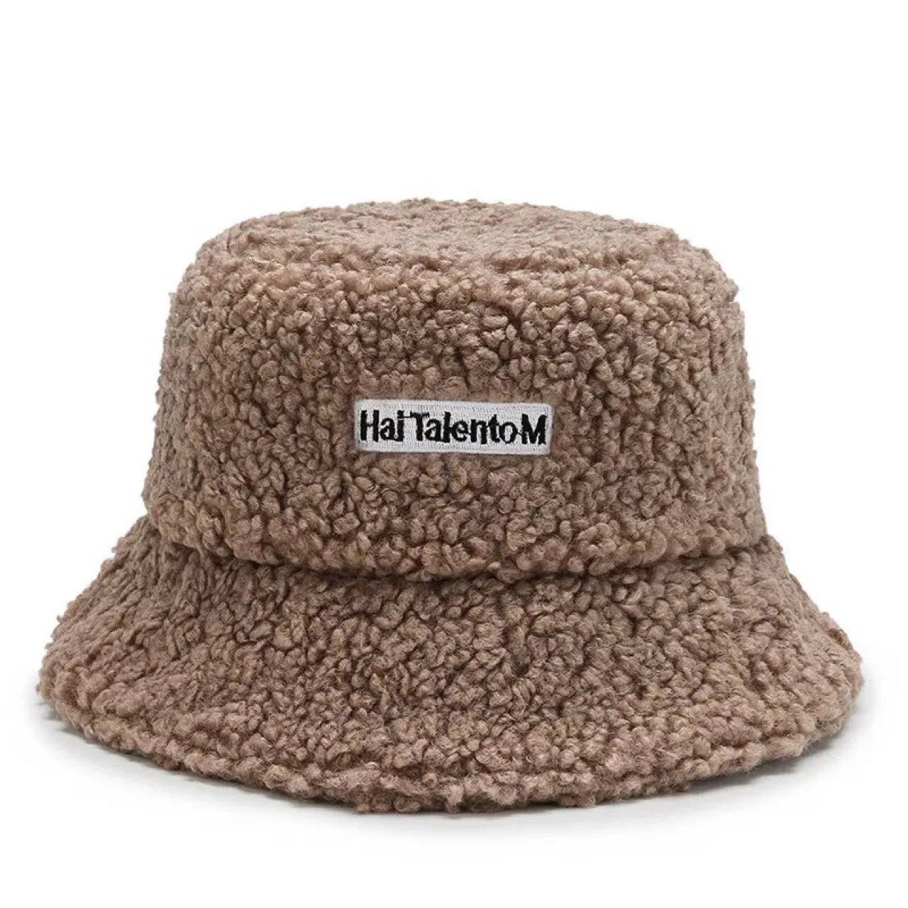 Lambswool unisex bucket hat for men and women, perfect for winter, outdoor activities, and sun protection. Panama fisherman's cap with embroidered lettering. Wholesale chapeau. Sizes: 56-58cm; Parallel import.