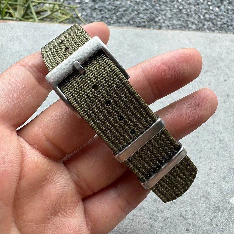 Fashion sports watch band in black, yellow, and gray. Ribbed nylon strap compatible with Blancpain, Omega, and Swatch models. Band color: mm. Ships from: Parallel import.