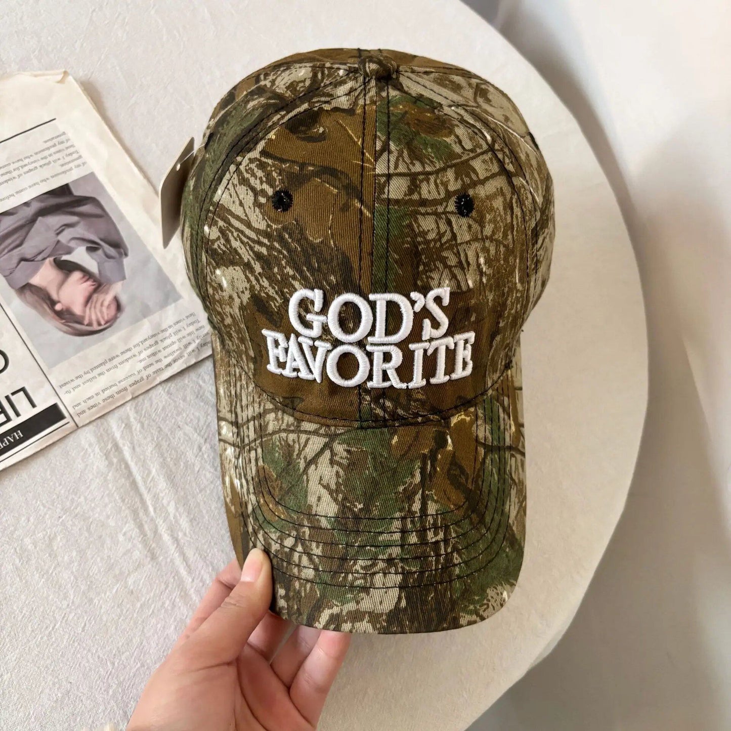 Versatile, trendy, and stylish embroidered camo cap with a spiritual message. Adjustable spring baseball cap. Sizes: 54-60cm; Ages: Teens to Adults; Ships from: Parallel Import