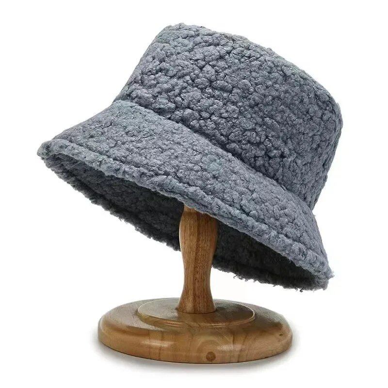 Lambswool unisex bucket hat for men and women, perfect for winter, outdoor activities, and sun protection. Panama fisherman's cap with embroidered lettering. Wholesale chapeau. Sizes: 56-58cm; Parallel import.