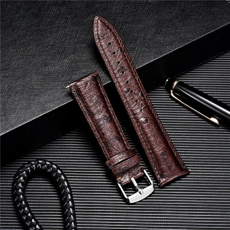 Ostrich-look leather strap, soft quick release, available in 18mm, 20mm, and 22mm sizes. Available in blue, black, red, and brown. Band color: mm. Parallel import.