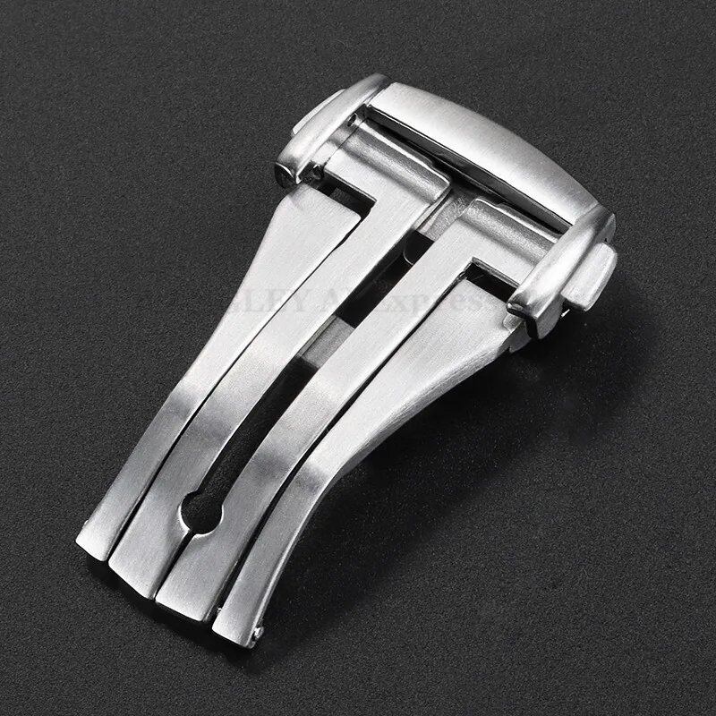 Folding butterfly buckle for 16mm, 18mm, and 20mm OMEGA Seamaster watches. 316L steel watch band clasp with matte and polished finish and double push-button strap. Band color: Parallel import.
