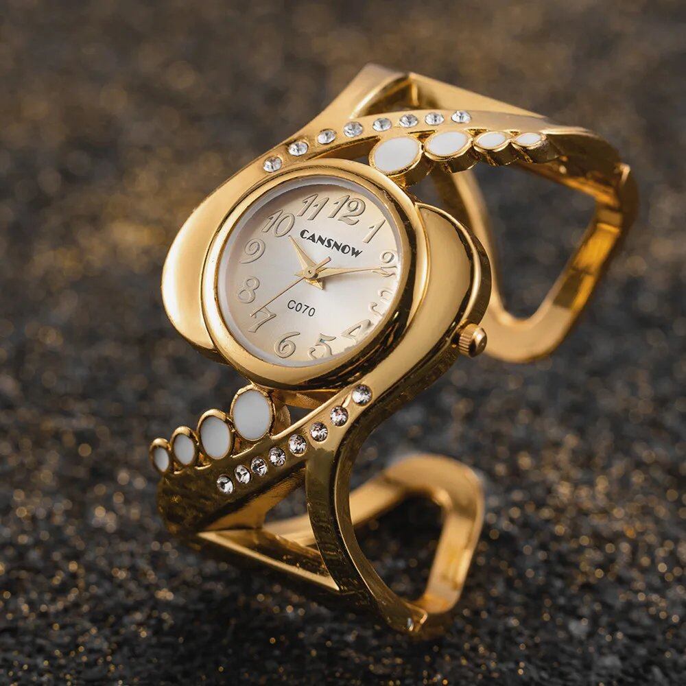 New Design Women's Bangle Quartz Wristwatch with Crystal and Rhinestone Detail. Popular and Elegant. Imported.
