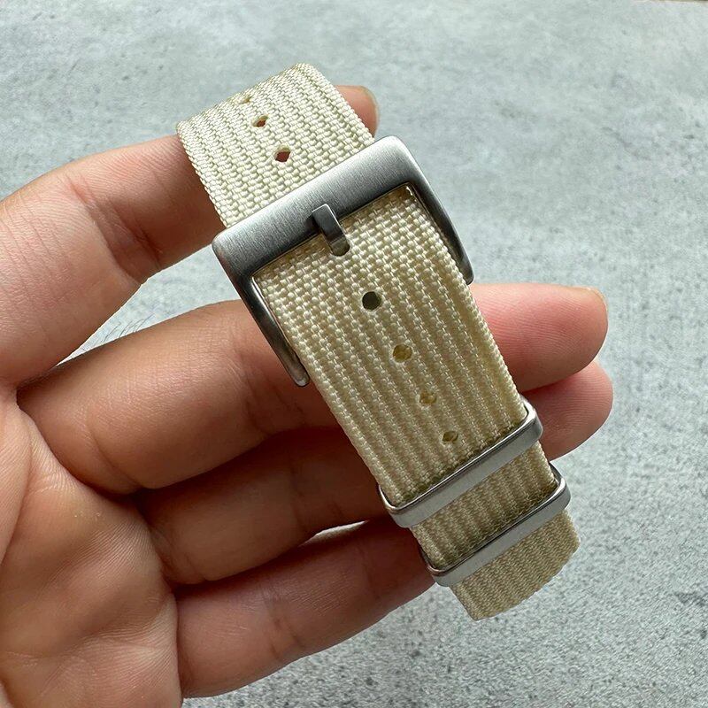 Fashion sports watch band in black, yellow, and gray. Ribbed nylon strap compatible with Blancpain, Omega, and Swatch models. Band color: mm. Ships from: Parallel import.