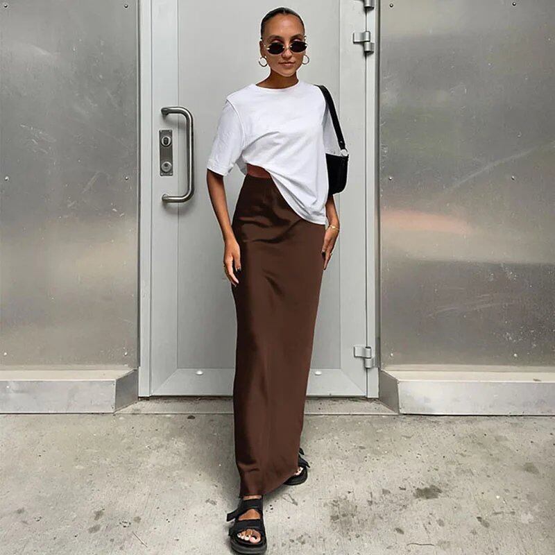Elegant black satin trumpet skirt for women. Slim, high-waisted, long skirt for spring and summer. Solid color. Size: Parallel import.