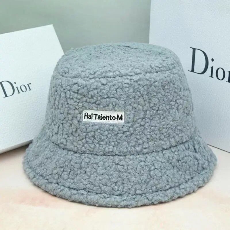 Lambswool unisex bucket hat for men and women, perfect for winter, outdoor activities, and sun protection. Panama fisherman's cap with embroidered lettering. Wholesale chapeau. Sizes: 56-58cm; Parallel import.