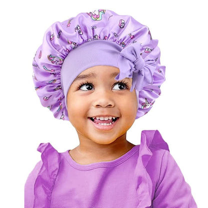 New Kids Unicorn Satin Bonnet with Wide Elastic Band and Ribbon, Perfect for Curly and Natural Hair, Perfect as a Nightcap, Shower Cap, or Headscarf. One Size; Imported.