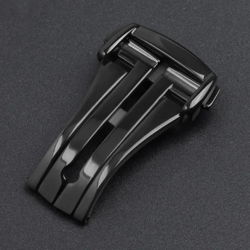 Folding butterfly buckle for 16mm, 18mm, and 20mm OMEGA Seamaster watches. 316L steel watch band clasp with matte and polished finish and double push-button strap. Band color: Parallel import.