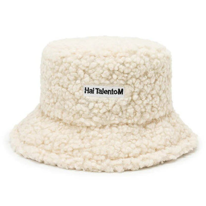 Lambswool unisex bucket hat for men and women, perfect for winter, outdoor activities, and sun protection. Panama fisherman's cap with embroidered lettering. Wholesale chapeau. Sizes: 56-58cm; Parallel import.