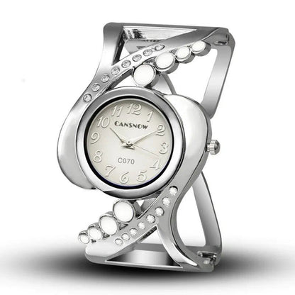 New Design Women's Bangle Quartz Wristwatch with Crystal and Rhinestone Detail. Popular and Elegant. Imported.