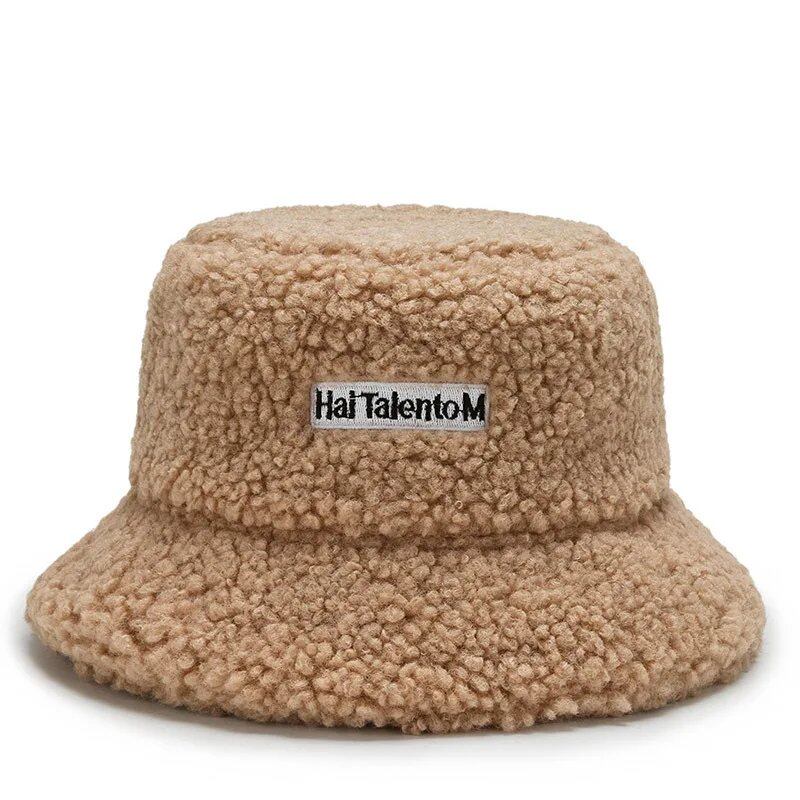Lambswool unisex bucket hat for men and women, perfect for winter, outdoor activities, and sun protection. Panama fisherman's cap with embroidered lettering. Wholesale chapeau. Sizes: 56-58cm; Parallel import.