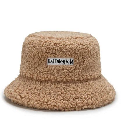 Lambswool unisex bucket hat for men and women, perfect for winter, outdoor activities, and sun protection. Panama fisherman's cap with embroidered lettering. Wholesale chapeau. Sizes: 56-58cm; Parallel import.