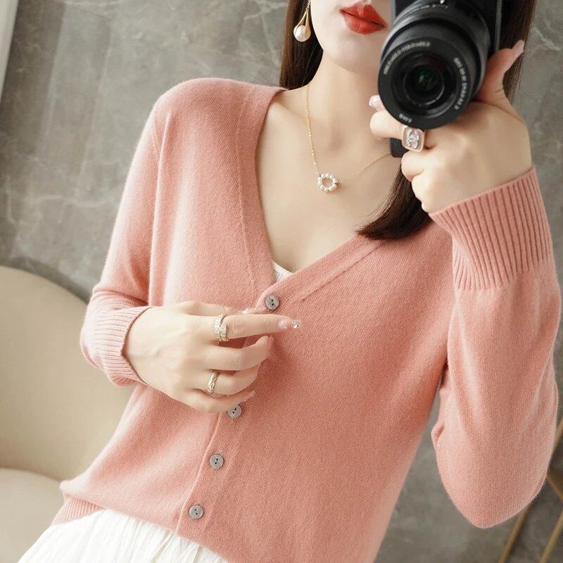New Arrival: Stylish V-neck sweater/cardigan in a subtle Xiao Xiang style. Special Price Coat. ZHI D035. Size: Parallel Import.