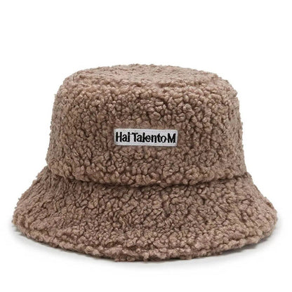 Lambswool unisex bucket hat for men and women, perfect for winter, outdoor activities, and sun protection. Panama fisherman's cap with embroidered lettering. Wholesale chapeau. Sizes: 56-58cm; Parallel import.