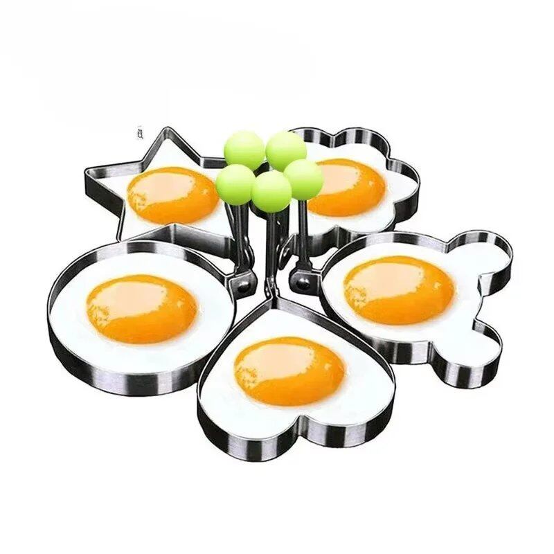 5-Piece Set of Stainless Steel Kitchen Cooking Rings in Round, Heart, Flower, Pentagram, Mouse, and Egg Shapes. Color: 5-Piece Set. Imported.