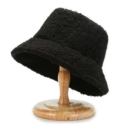 Lambswool unisex bucket hat for men and women, perfect for winter, outdoor activities, and sun protection. Panama fisherman's cap with embroidered lettering. Wholesale chapeau. Sizes: 56-58cm; Parallel import.