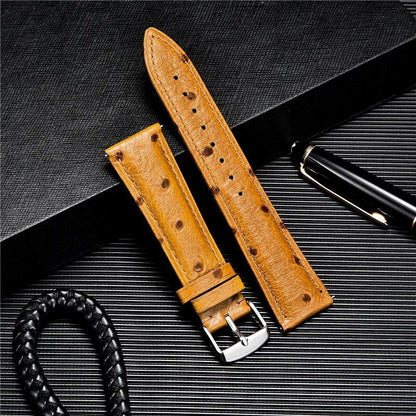 Ostrich-look leather strap, soft quick release, available in 18mm, 20mm, and 22mm sizes. Available in blue, black, red, and brown. Band color: mm. Parallel import.